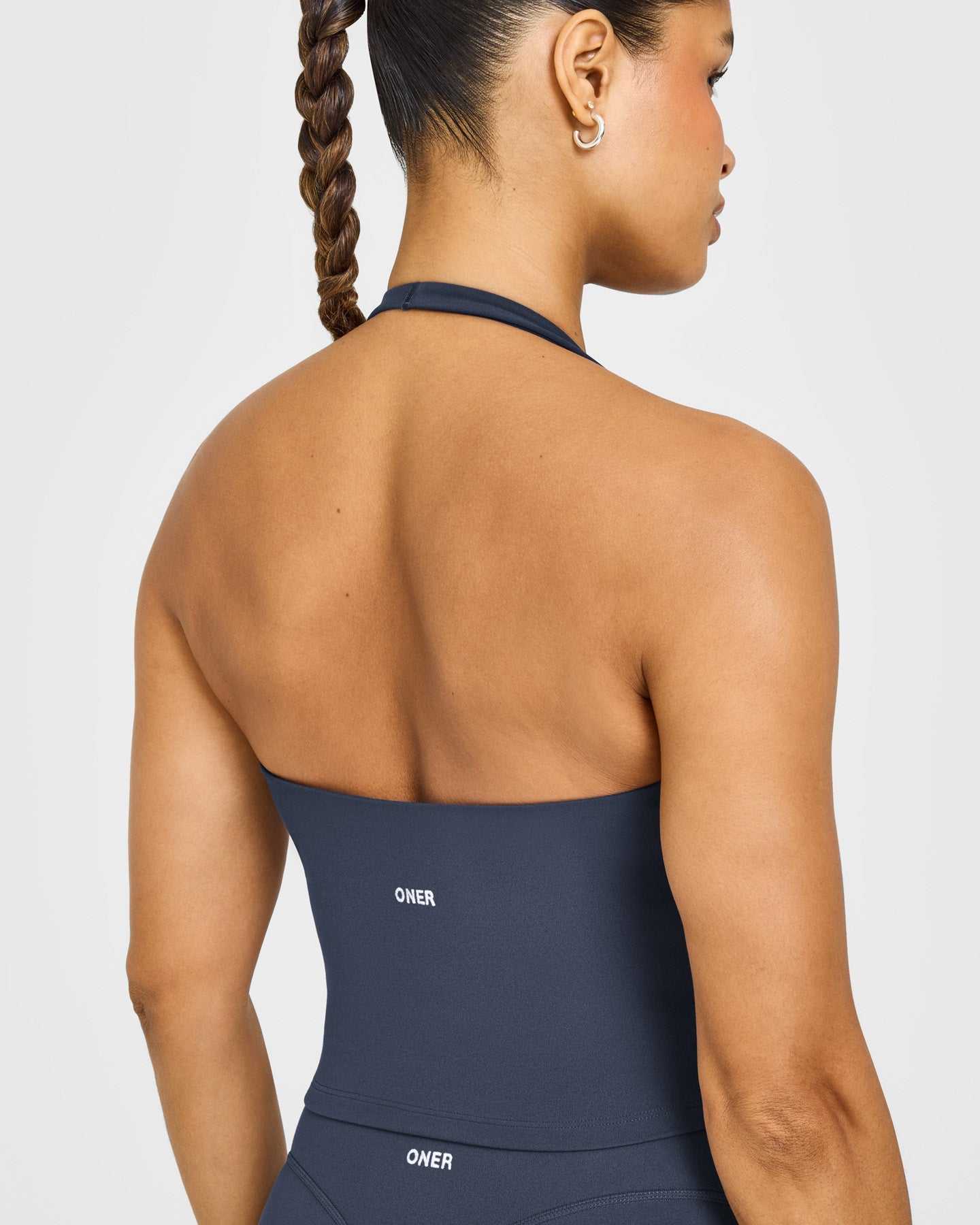 SoftMotion™ Halter Neck Mid Vest with Built in Bra Shelf with White Logo | True Blue