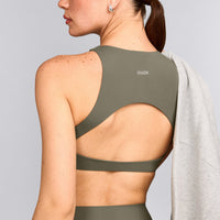 SoftMotion™ High Neck Sports Bra with Grey Logo | Alpine Green