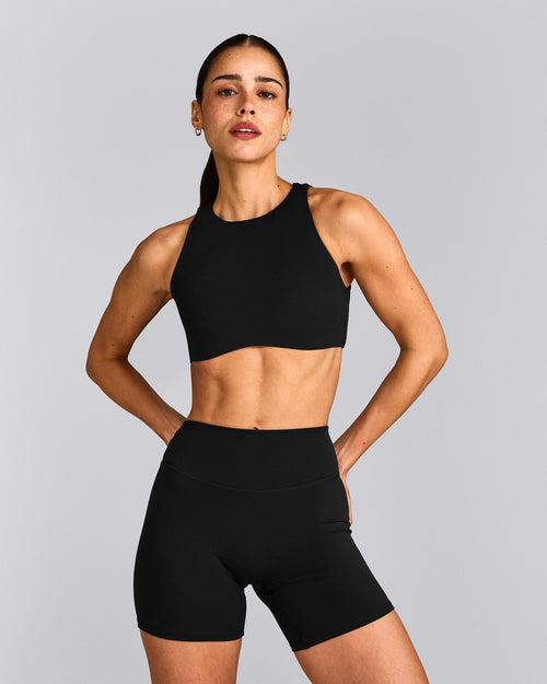 SoftMotion™ High Neck Sports Bra with Gray Logo | Black