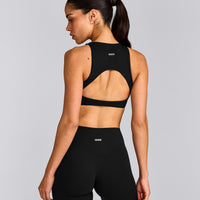 SoftMotion™ High Neck Sports Bra with Gray Logo | Black