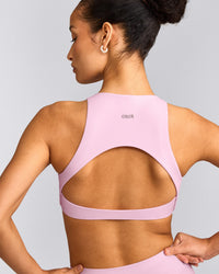SoftMotion™ High Neck Sports Bra with Grey Logo | Chalk Pink