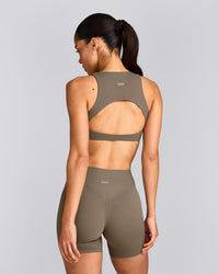 SoftMotion™ High Neck Sports Bra with Grey Logo | Moss Brown