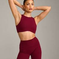SoftMotion™ High Neck Sports Bra with Grey Logo | Ruby Red