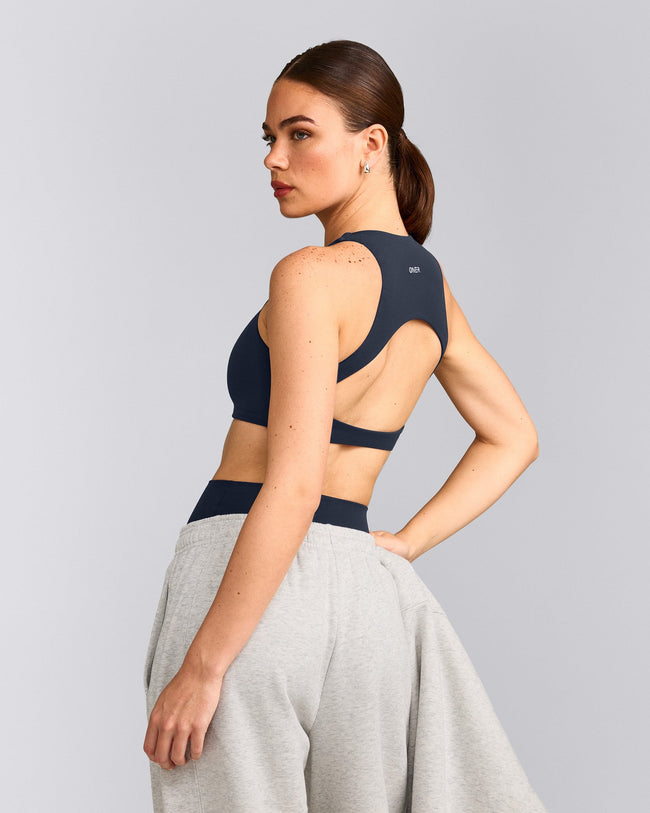 SoftMotion™ High Neck Sports Bra with Grey Logo | True Blue