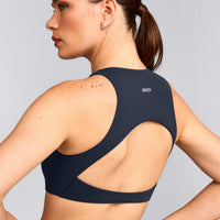 SoftMotion™ High Neck Sports Bra with Grey Logo | True Blue