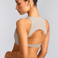 SoftMotion™ High Neck Sports Bra with White Logo | Warm Sand