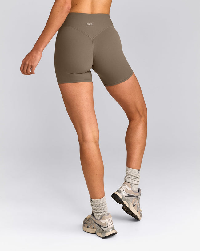 SoftMotion™ High Waisted Shorts 6" with Grey Logo | Moss Brown