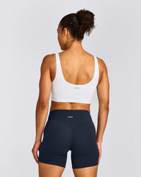 SoftMotion™ Longline Sports Bra with Gray Logo | White