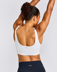 SoftMotion™ Longline Sports Bra with Gray Logo | White