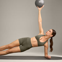 SoftMotion™ Minimal Halter Neck Bralette with Grey Logo | Alpine Green