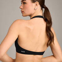 SoftMotion™ Minimal Halter Neck Bralette with Grey Logo | Black