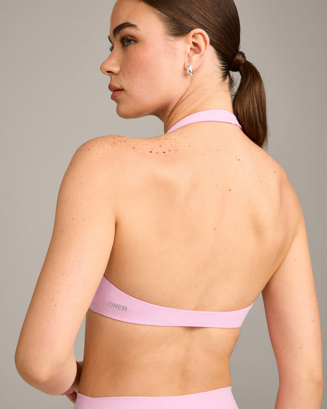SoftMotion™ Minimal Halter Neck Bralette with Grey Logo | Chalk Pink