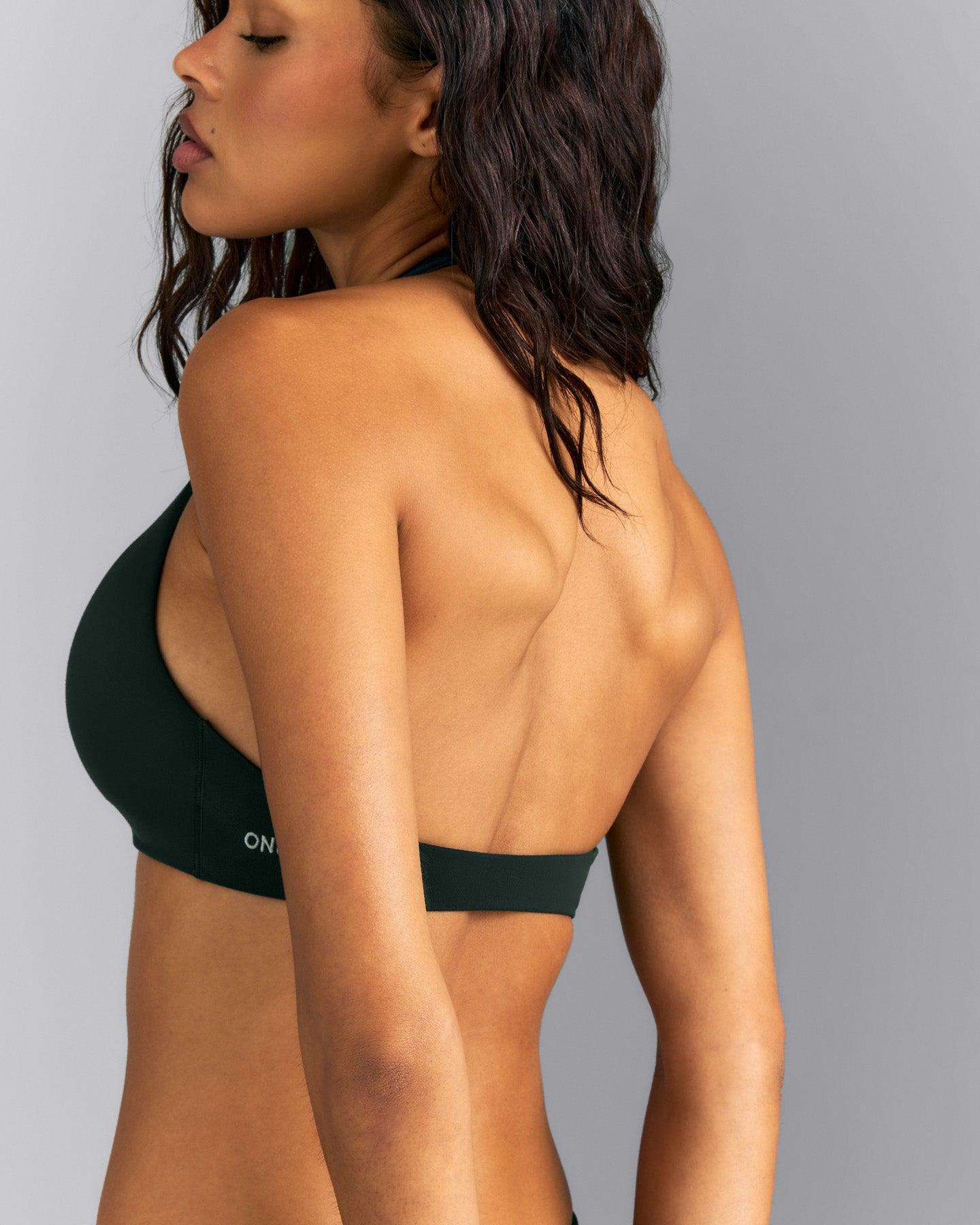 SoftMotion™ Minimal Halter Neck Bralette | Emerald Noir