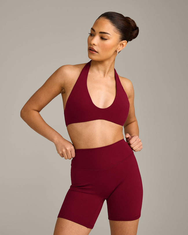 SoftMotion™ Minimal Halter Neck Bralette with Grey Logo | Ruby Red