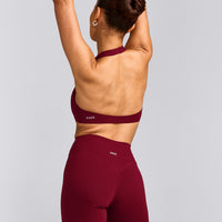 SoftMotion™ Minimal Halter Neck Bralette with Gray Logo | Ruby Red