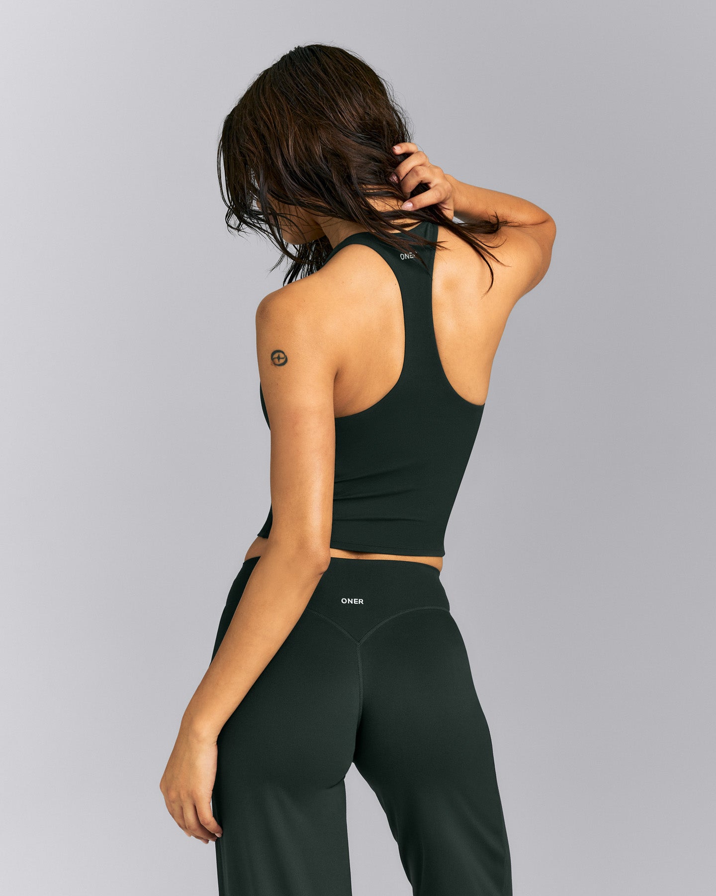 SoftMotion™ Racer Back Mid Tank Top with Built in Bra Shelf | Emerald Noir