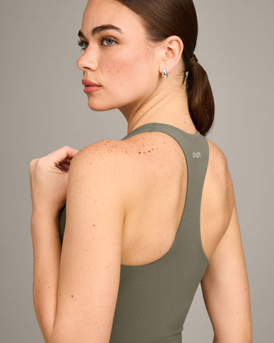 SoftMotion™ Racer Back Vest with Built in Bra Shelf with Grey Logo | Alpine Green