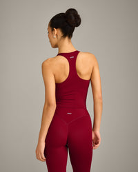 SoftMotion™ Racer Back Mid Vest with Built in Bra Shelf with Grey Logo | Ruby Red