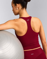 SoftMotion™ Racer Back Mid Vest with Built in Bra Shelf with Grey Logo | Ruby Red