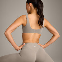 SoftMotion™ Scoop Back Bralette with White Logo | Warm Sand