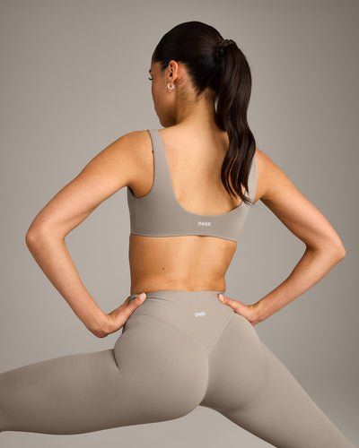 SoftMotion™ Scoop Back Bralette with White Logo | Warm Sand