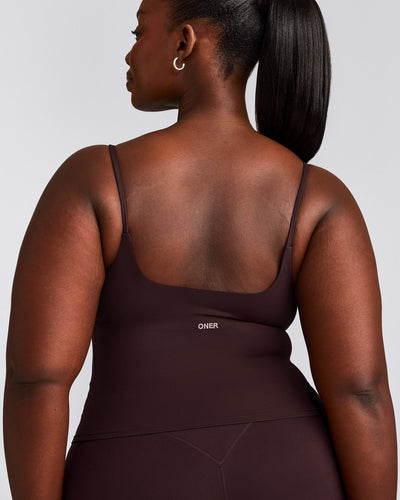 SoftMotion™ Strappy Mid Vest with Built in Bra Shelf with Grey Logo | Plum Brown