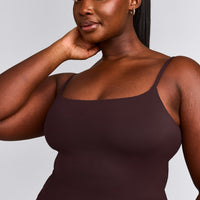 SoftMotion™ Strappy Mid Vest with Built in Bra Shelf with Grey Logo | Plum Brown