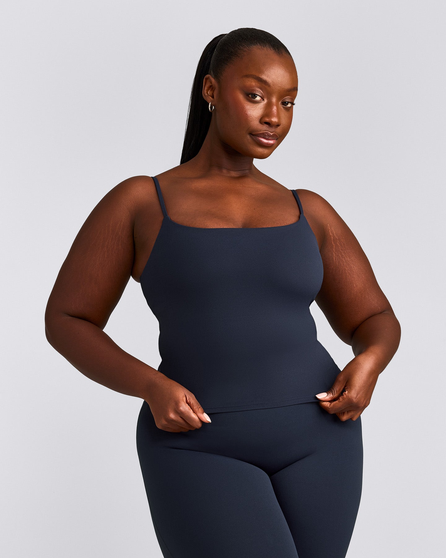 SoftMotion™ Strappy Mid Vest with Built in Bra Shelf with Grey Logo | True Blue