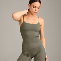 SoftMotion™ Strappy Mid Vest with Built in Bra Shelf with Grey Logo | Alpine Green