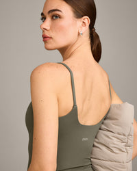 SoftMotion™ Strappy Mid Vest with Built in Bra Shelf with Grey Logo | Alpine Green