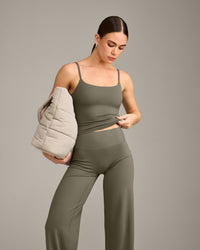 SoftMotion™ Strappy Mid Vest with Built in Bra Shelf with Grey Logo | Alpine Green