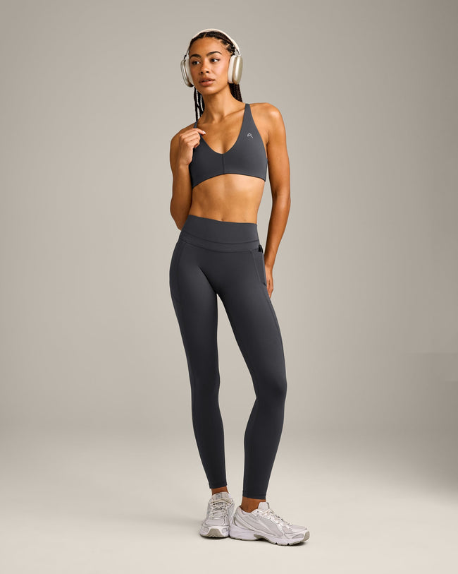 UnifiedMove High Waisted Pocket Leggings with Reflective Logo | Coal