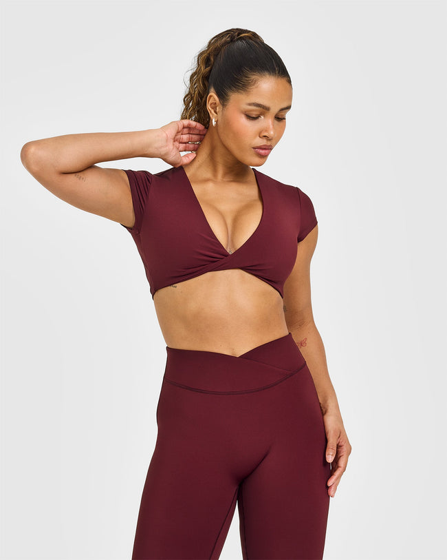 Unified Twist Front Short Sleeve Crop Top White Logo | Rosewood