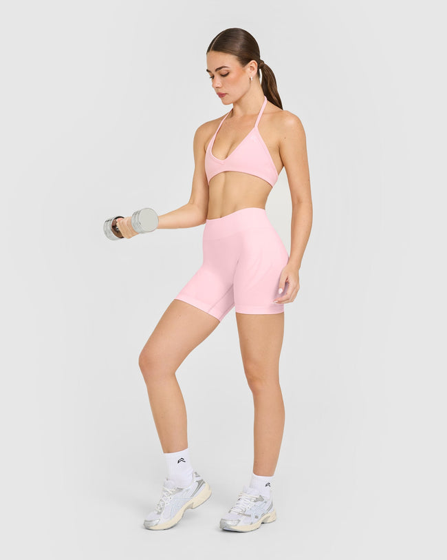 EnhanceLift™ Seamless Minimal Halter Neck Bralette with White Logo | Cherry Blossom Pink