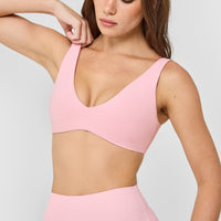 SoftMotion™ Scoop Back Bralette with White Logo | Cherry Blossom Pink