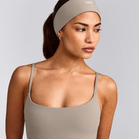 SoftMotion™ Headband with White Logo | Warm Sand
