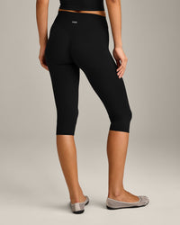 SoftMotion™ High Waisted Capri Leggings with Grey Logo | Black