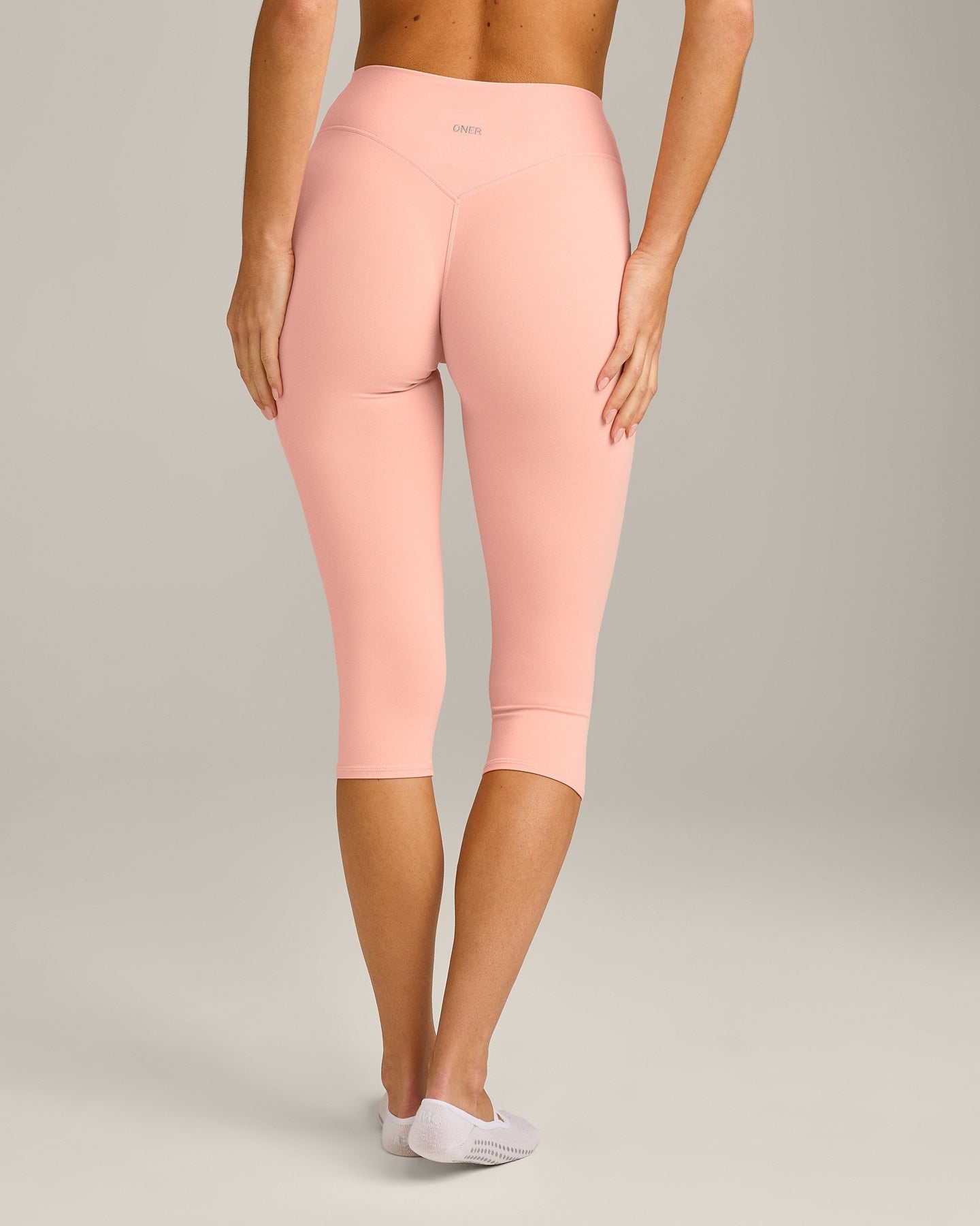 SoftMotion™ High Waisted Capri Leggings with Grey Logo | Peach Orange