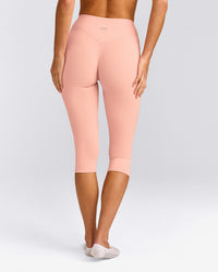 SoftMotion™ High Waisted Capri Leggings with Grey Logo | Peach Orange