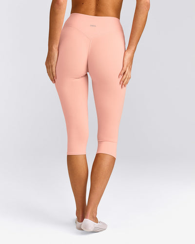 SoftMotion™ High Waisted Capri Leggings with Grey Logo | Peach Orange