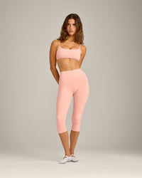 SoftMotion™ High Waisted Capri Leggings with Grey Logo | Peach Orange