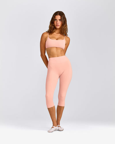 SoftMotion™ High Waisted Capri Leggings with Grey Logo | Peach Orange