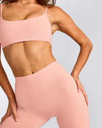 SoftMotion™ High Waisted Capri Leggings with Grey Logo | Peach Orange