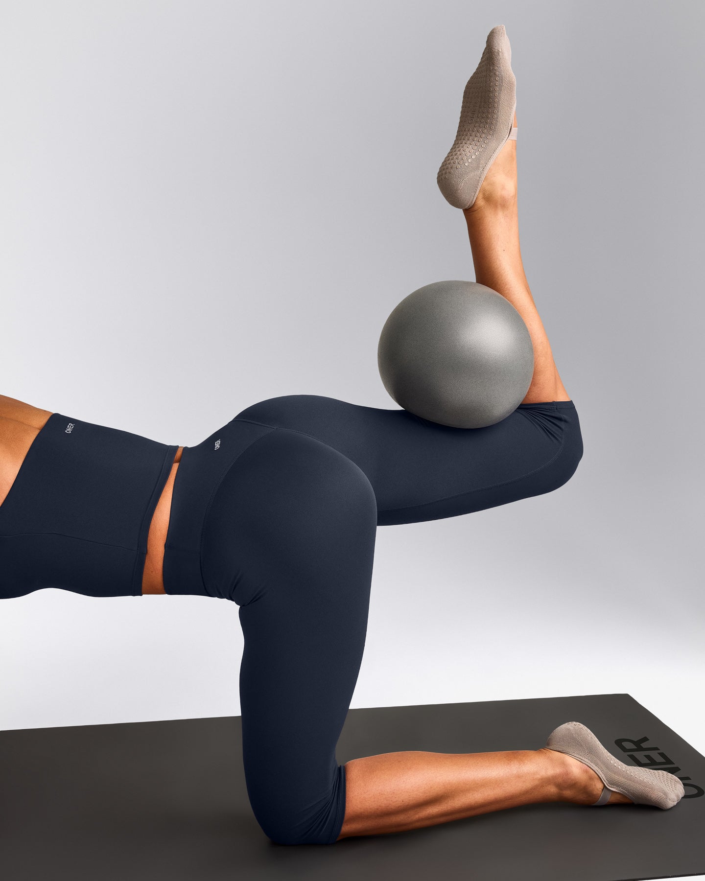 SoftMotion™ High Waisted Capri Leggings with Grey Logo | True Blue