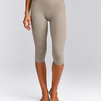 SoftMotion™ High Waisted Capri Leggings with White Logo | Warm Sand