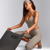SoftMotion™ High Waisted Capri Leggings with White Logo | Warm Sand