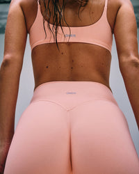 SoftMotion™ High Waisted Shorts 6" with Grey Logo | Peach Orange
