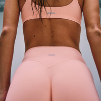 SoftMotion™ High Waisted Shorts 6" with Grey Logo | Peach Orange