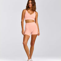 SoftMotion™ Longline Sports Bra with Grey Logo | Peach Orange
