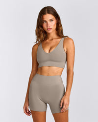 SoftMotion™ Longline Sports Bra with White Logo | Warm Sand